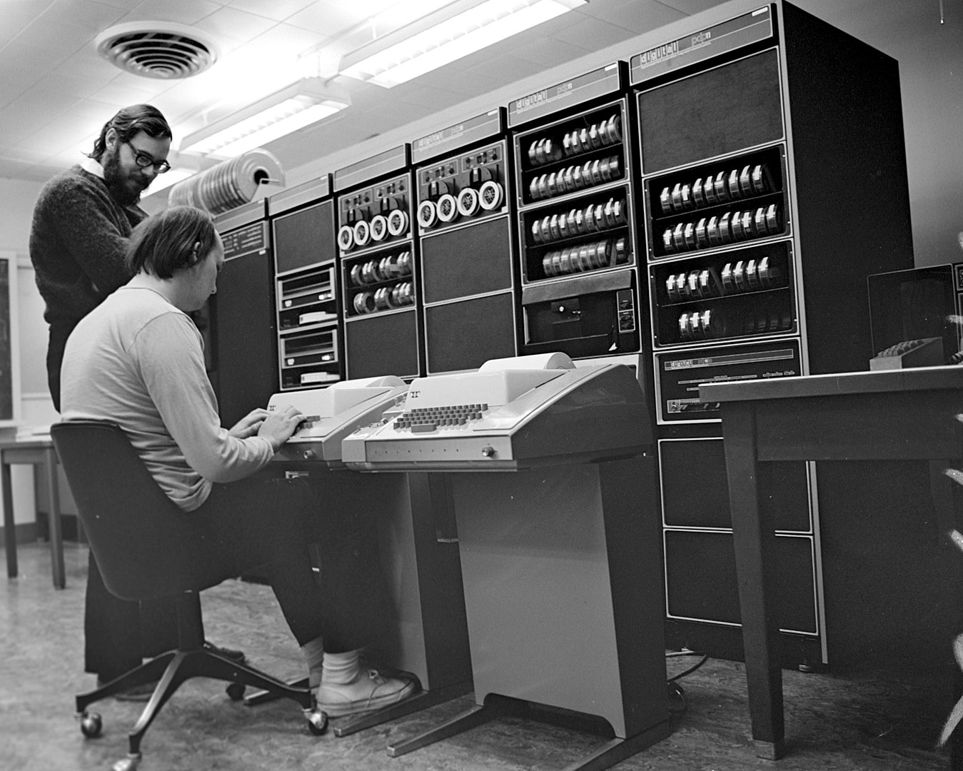 Ken Thompson and Dennis Ritchie working as a PDP-11